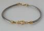 Preview: Edelstahl Seilarmband mit 750er Goldelementen und Karabinerverschluss