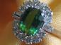 Preview: Smaragdring 3.0 ct. mit Diamantkranz 1.26 ct., 750er Weißgold, Größe 57, Gewicht: 8,8g