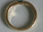 Preview: Eleganter Bandring aus 750er Gold mit Diamanten und Samargd, Größe 61, Gewicht: 8,2g
