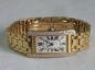 Preview: Cartier Tank Americaine Large, Damenarmbanduhr aus 750er Gold mit 99 Diamanten