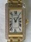 Preview: Cartier Tank Americaine Large, Damenarmbanduhr aus 750er Gold mit 99 Diamanten