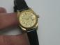 Preview: Geneve Damenarmbanduhr 750 Gold mit schwarzem Lackband
