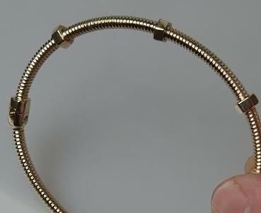 Schraubenarmreif mit beweglichen Schrauben und Verschluss, 585er Gold, Gewicht: 7,8g