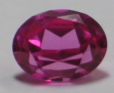 Rubin, Pink, Ovalschliff, Maße: 9,98 x 7,95 x 5,69mm, Gewicht: 3.7 ct.
