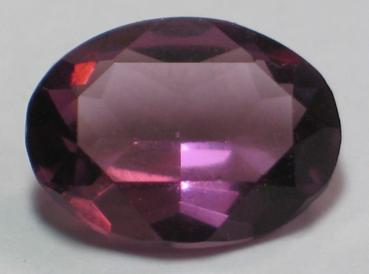 Zirkonia, lila, Ovalschliff, Maße: 15,84 x 11,94 x 6,52mm, Gewicht: 8.3 ct.