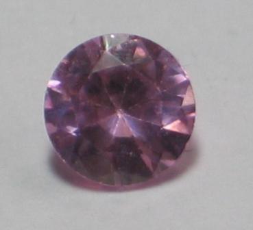 Zirkonia, rosa, Rundschliff, Maße: 5,96-5,97 x 3,59mm, Gewicht: 1.4 ct.