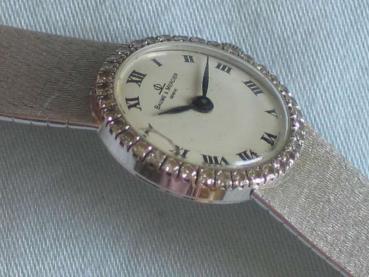 Diamantuhr Baume & Mercier aus 750er Weißgold mit Diamantlünette, Länge 16,5 cm