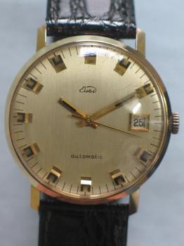 Vintage Herrenarmbanduhr "Eusi" Automatikwerk, 585er Gold mit Lederband