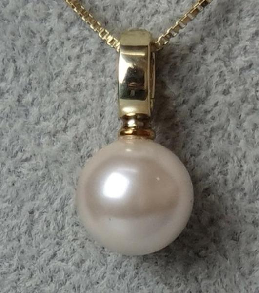 Perlenanhänger mit großer elfenbeinfarbener Rundperle und Clipverschluß, 585er Gold, Gewicht: 4,2g