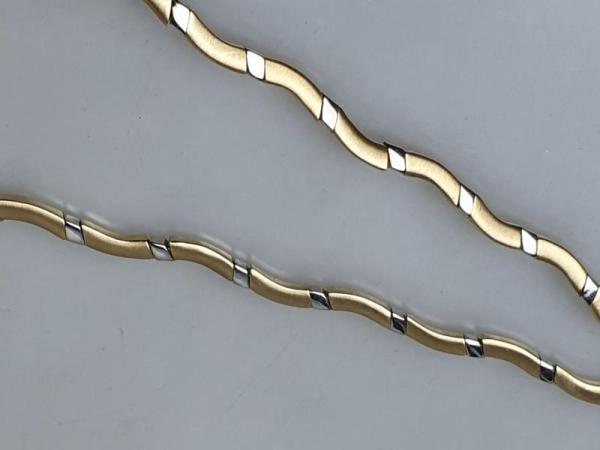 Bicolor Wellen Halskette aus 585er Gelb- und Weißgold, Länge ca. 42-45 cm, Gewicht: 27,2g