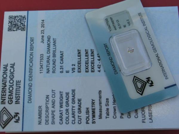 Diamant im Brillantschliff 0.31 ct, 3x Excellent! mit IGI Report, Lasergravur