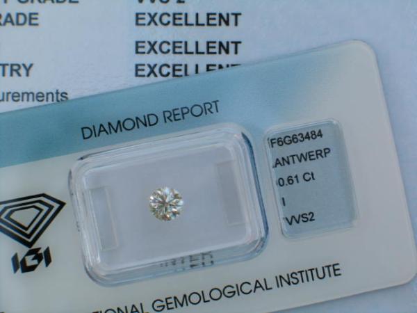 Diamant im Brillantschliff 0.61 ct, 3x Excellent! mit IGI Report, Lasergravur