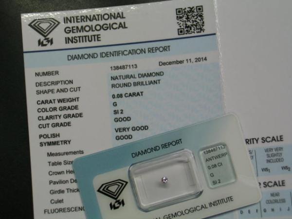 Diamant im Brillantschliff 0.08 ct/ G/ SI2/ G/ VG/ G/ N mit IGI Report