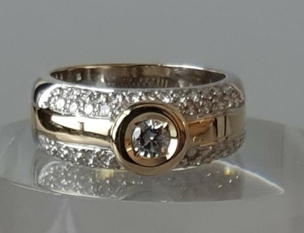 Christ Brillantring 55 Diamanten 1.5 ct. aus 585er Weiß- Gelbgold, Größe 59, Gewicht: 11,3g