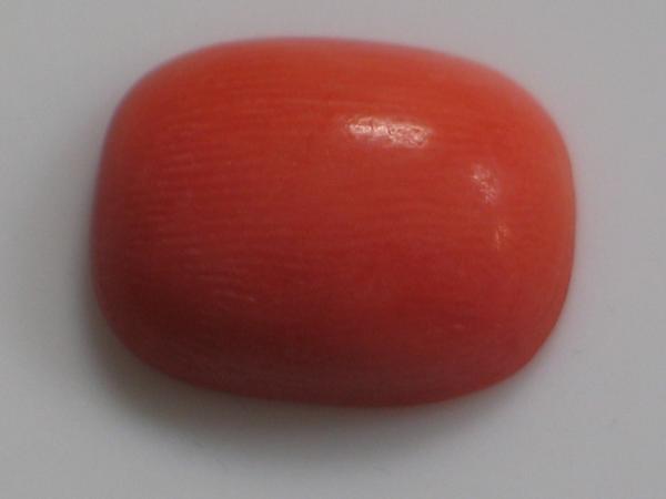 Koralle , Cabochon Masse (L/B/H):13,26x10,32x4,44 mm - 4.8 ct.