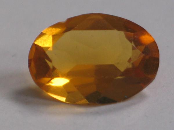 Citrin, oval, orange, 4.4 ct, Maße: 13,92 x 9,97 x 5,99 mm Synthese