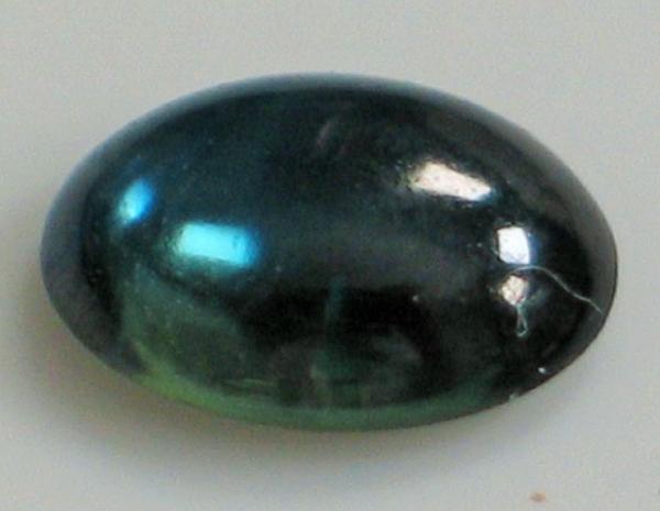 Saphir Cabochon, blaugrün, Maße: 8,97 x 7,00 x 3,03 mm, Gewicht: 2.1 ct.