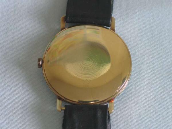 Vintage Herrenarmbanduhr "Arctos" 585er Gold mit Lederband Gewicht ca. 37,7 Gramm