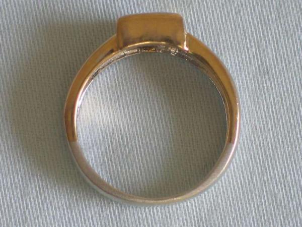 Ring aus 333er Weiss/ Gelbgold mit einem Zirkonia, Größe 53, Gewicht: 3,4g