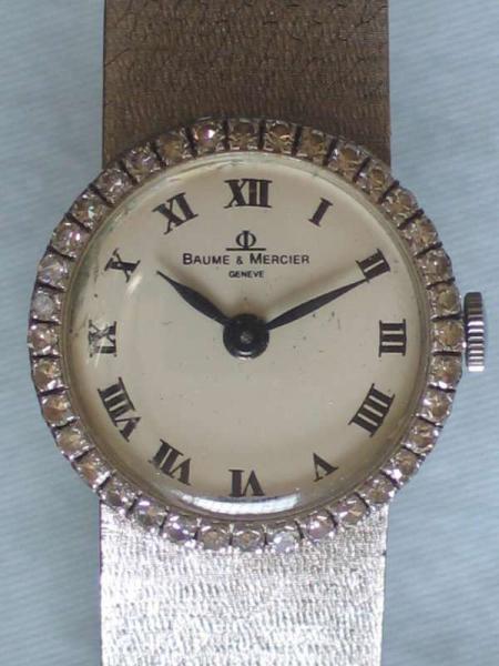Diamantuhr Baume & Mercier aus 750er Weißgold mit Diamantlünette, Länge 16,5 cm