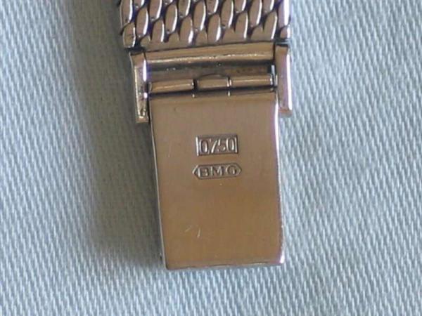 Diamantuhr Baume & Mercier aus 750er Weißgold mit Diamantlünette, Länge 16,5 cm