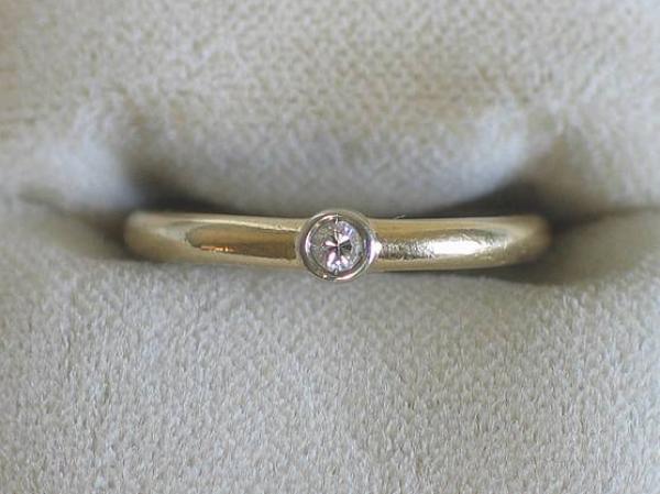 Feiner Brillantsolitär mit 0.05 ct. aus 750er Gelbgold, Größe 51, Gewicht: 2,7g