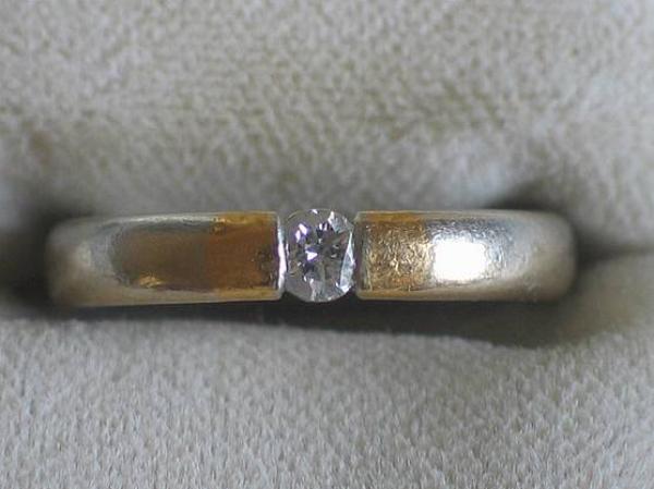 Brillantring mit 0.10 ct. aus 950er Platin mit Gelbgoldstreifen, Größe 51, Gewicht: 7,0g