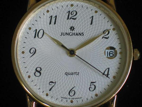 Junghans Armbanduhr 585 Gold mit cognacfarbenem Lederarmband in Originalbox, Unisex Gewicht: 27,7 Gramm