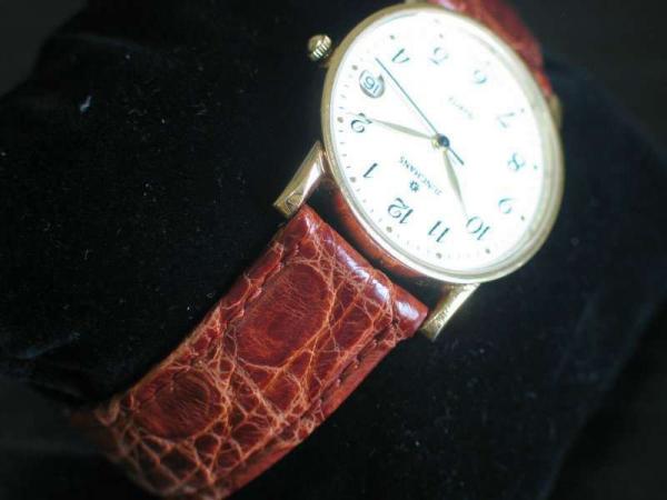 Junghans Armbanduhr 585 Gold mit cognacfarbenem Lederarmband in Originalbox, Unisex Gewicht: 27,7 Gramm