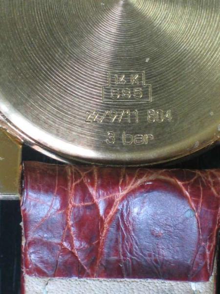 Junghans Armbanduhr 585 Gold mit cognacfarbenem Lederarmband in Originalbox, Unisex Gewicht: 27,7 Gramm