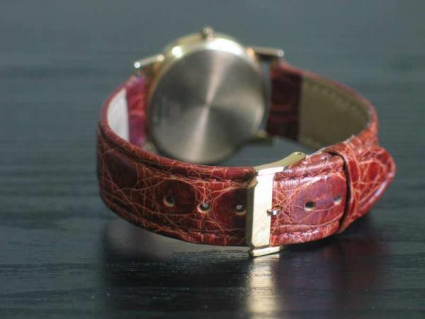 Junghans Armbanduhr 585 Gold mit cognacfarbenem Lederarmband in Originalbox, Unisex Gewicht: 27,7 Gramm