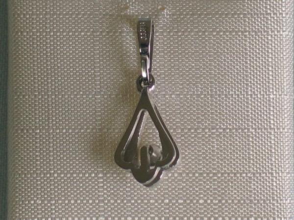 Neuware: Anhänger aus 333er Weissgold mit einem Diamanten, Gewicht: 0,8 Gramm. Erheblich reduziert.