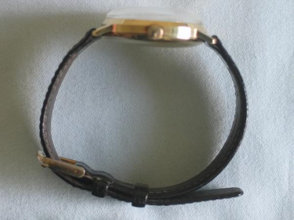 Vintage Herrenarmbanduhr "Eusi" Automatikwerk, 585er Gold mit Lederband