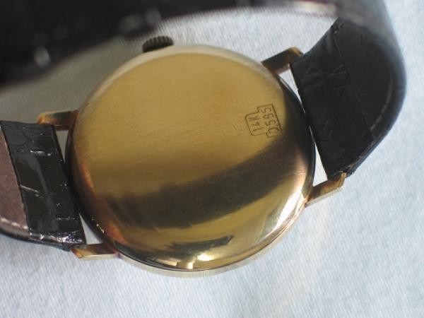 Vintage Herrenarmbanduhr "Eusi" Automatikwerk, 585er Gold mit Lederband