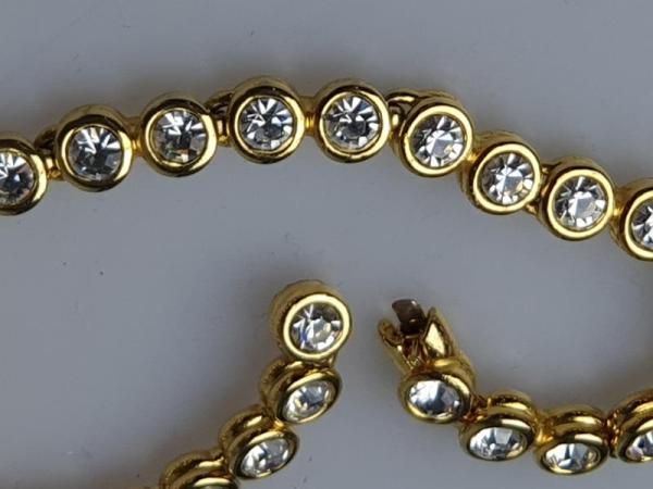 Elegantes Tennisarmband mit Schmucksteinen, vergoldet, Länge 19 cm