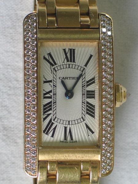 Cartier Tank Americaine Large, Damenuhr aus 750er Gold mit 99 Diamanten