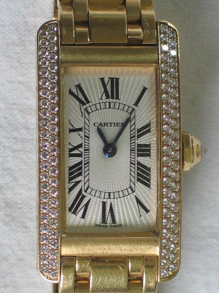 Cartier Tank Americaine Large, Damenarmbanduhr aus 750er Gold mit 99 Diamanten