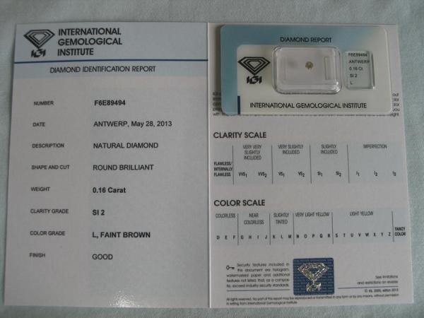 Diamant im Brillantschliff 0.16 ct / SI2 / L, Faint Brown / Good / mit IGI Report