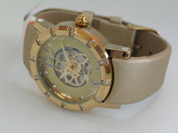 Attractive Damenuhr mit Kunstlederband, gelbgoldene Lünette mit Schmucksteinbesatz