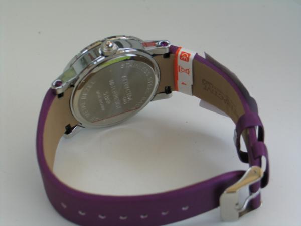 Attractive Damenuhr mit Kunstlederband, silberne Lünette mit Schmucksteinbesatz